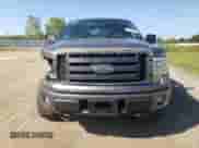 2009 Ford F-150 STX with VIN 1FTRX14W79FB26020, listed as a Copart auction lot 71348725 with 130,749 mi miles and Salvage title. Bid and sale history available at DreamBid. Image 5.