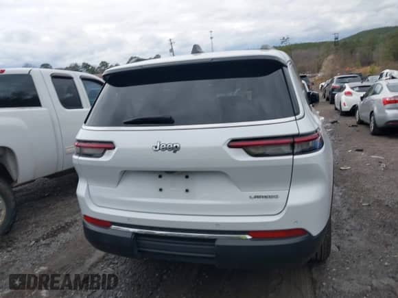 2023 Jeep Grand Cherokee Laredo z VIN 1C4RJJAG5P8843337, wystawiony jako IAAI lot #41735195 z przebiegiem 50 762 mil mil oraz . Historia ofert i sprzedaży dostępna na DreamBid. Obrazek 16.