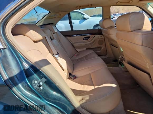 1998 BMW 7 Series 740i with VIN WBAGF8325WDL51588, listed as a Copart auction lot 53162975 with 121,919 mi miles and Salvage title. Bid and sale history available at DreamBid. Image 10.