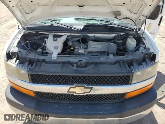2014 Chevrolet Express Passenger LT с VIN 1GAZG1FG6E1122739, выставлен на аукционе Copart как лот 56582675 с пробегом 85 925 миль миль и Списание • Salvage title. История ставок и продаж доступна на DreamBid. Изображение 12.
