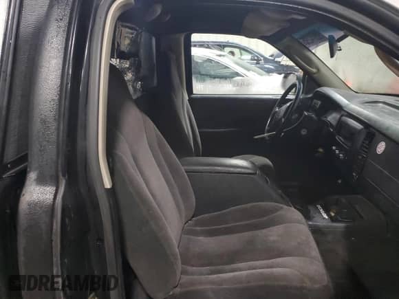 2002 Dodge Dakota z VIN 1B7FL16X32S557570, wystawiony jako Copart lot #88974295 z przebiegiem 201 791 mil mil oraz Szkoda całkowita • Salvage title. Historia ofert i sprzedaży dostępna na DreamBid. Obrazek 10.