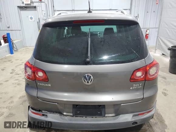 2010 Volkswagen Tiguan с VIN WVGBV9AX4AW526250, выставлен на аукционе Copart как лот 69597415 с пробегом Не указан миль и Списание • Salvage title. История ставок и продаж доступна на DreamBid. Изображение 6.