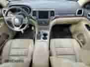 2018 Jeep Grand Cherokee Sterling z VIN 1C4RJFBG3JC344245, wystawiony jako Copart lot #58357395 z przebiegiem 99 639 mil mil oraz Czysty tytuł • Clean title. Historia ofert i sprzedaży dostępna na DreamBid. Obrazek 8.