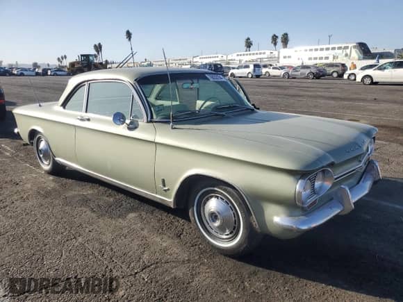 1964 Chevrolet Corvair with VIN 40927W261021, listed as a Copart auction lot 76832294 with 22,768 mi miles and Salvage title. Bid and sale history available at DreamBid. Image 4.