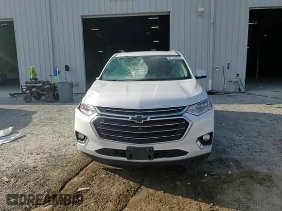 2018 Chevrolet Traverse Premier with VIN 1GNERKKW6JJ156068, listed as a Copart auction lot 81706905 with 148,091 mi miles and Salvage title. Bid and sale history available at DreamBid. Image 14.