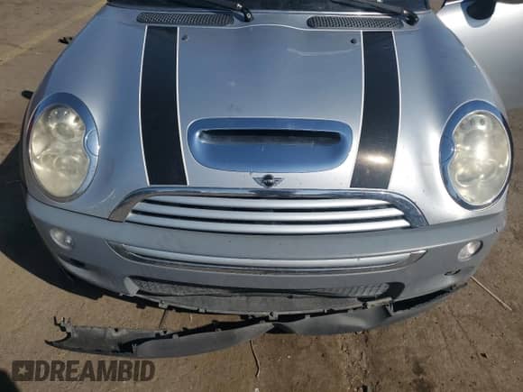 2006 MINI Hardtop S с VIN WMWRE33586TJ37385, выставлен на аукционе Copart как лот 86484315 с пробегом 78 669 миль миль и Списание • Salvage title. История ставок и продаж доступна на DreamBid. Изображение 11.