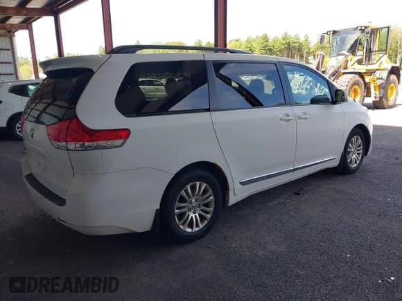 2011 Toyota Sienna XLE AAS with VIN 5TDYK3DC7BS107419, listed as a IAAI auction lot 43080723 with 169,485 mi miles and . Bid and sale history available at DreamBid. Image 4.