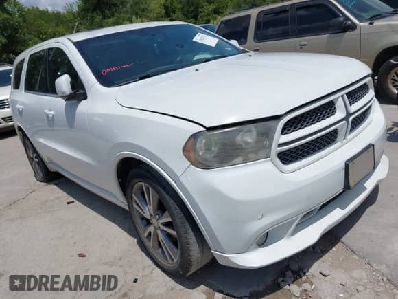 2013 Dodge Durango R/T with VIN 1C4SDHCT4DC658023, listed as a IAAI auction lot 43020765 with 252,063 mi miles and . Bid and sale history available at DreamBid. Image 1.