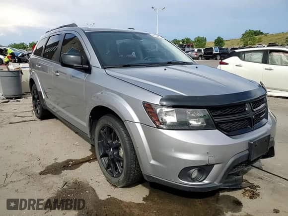 2018 Dodge Journey SXT z VIN 3C4PDDBG9JT243976, wystawiony jako Copart lot #64134815 z przebiegiem 70 410 mil mil oraz Szkoda całkowita • Salvage title. Historia ofert i sprzedaży dostępna na DreamBid. Obrazek 14.