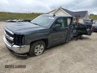 2018 Chevrolet Silverado 1500 LT with VIN 1GCVKREH3JZ307856, listed as a Copart auction lot 71601225 with 122,046 mi miles and Salvage title. Bid and sale history available at DreamBid. Image 1.
