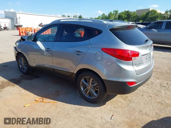 2014 Hyundai Tucson SE with VIN KM8JU3AG8EU863243, listed as a IAAI auction lot 43053128 with 76,818 mi miles and . Bid and sale history available at DreamBid. Image 3.