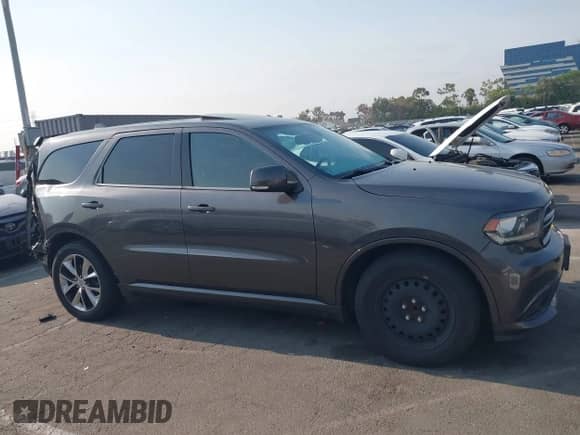 2014 Dodge Durango R/T with VIN 1C4SDHCT1EC405517, listed as a IAAI auction lot 42900132 with 141,872 mi miles and . Bid and sale history available at DreamBid. Image 13.