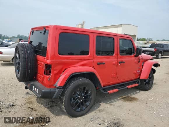 2022 Jeep Wrangler Unlimited Sahara with VIN 1C4JJXP66NW257740, listed as a Copart auction lot 66473935 with 21,823 mi miles and Salvage title. Bid and sale history available at DreamBid. Image 3.