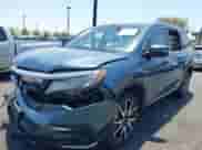 2021 Honda Pilot Touring 7-Passenger z VIN 5FNYF5H63MB039129, wystawiony jako IAAI lot #42455224 z przebiegiem Nie podano mil oraz . Historia ofert i sprzedaży dostępna na DreamBid. Obrazek 16.