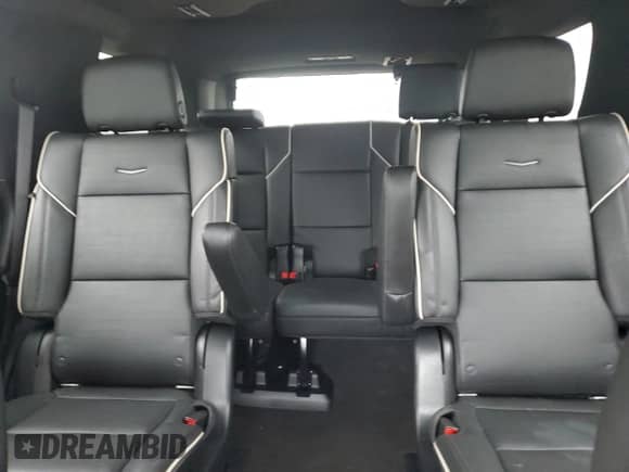 2022 Cadillac Escalade Premium Luxury с VIN 1GYS4BKL3NR164999, выставлен на аукционе Copart как лот 58035295 с пробегом 42 871 миль миль и Списание • Salvage title. История ставок и продаж доступна на DreamBid. Изображение 10.