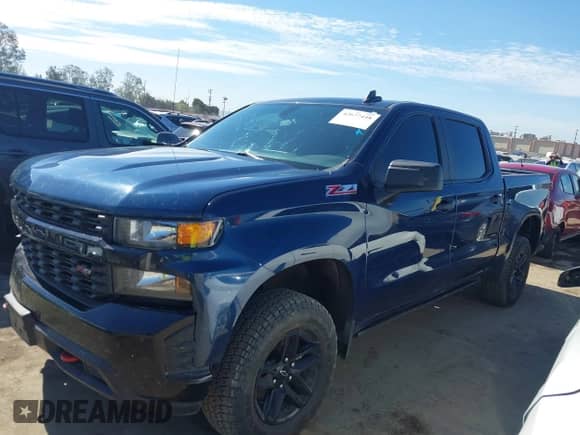 2021 Chevrolet Silverado 1500 Custom Trail Boss with VIN 1GCPYCEF4MZ234391, listed as a IAAI auction lot 42677448 with 87,228 mi miles and . Bid and sale history available at DreamBid. Image 14.