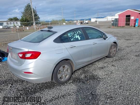 2018 Chevrolet Cruze LS with VIN 1G1BB5SMXJ7188902, listed as a IAAI auction lot 41896739 with 104,084 mi miles and . Bid and sale history available at DreamBid. Image 4.