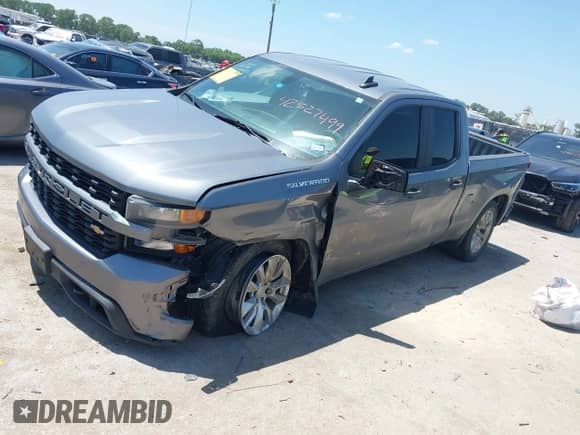 2021 Chevrolet Silverado 1500 Custom with VIN 1GCRWBEKXMZ305390, listed as a IAAI auction lot 42527499 with 119,325 mi miles and . Bid and sale history available at DreamBid. Image 17.