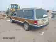 1991 Dodge Grand Caravan with VIN 1B4GK54R4MX558183, listed as a IAAI auction lot 41604086 with 210,400 mi miles and . Bid and sale history available at DreamBid. Image 3.