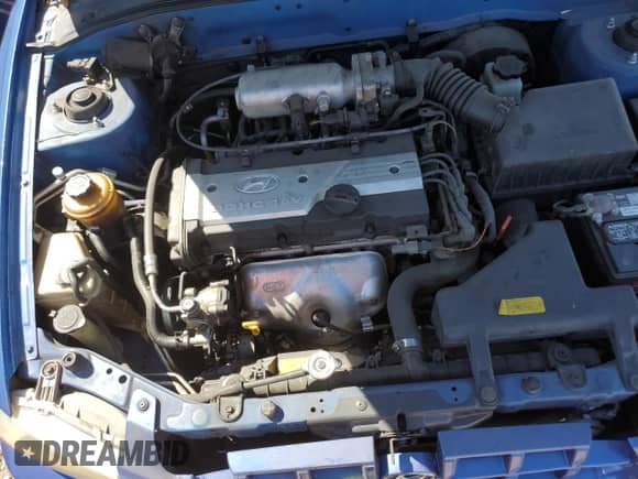 2002 Hyundai Accent GL с VIN KMHCG45C32U332833, выставлен на аукционе Copart как лот 66539644 с пробегом 69 763 миль миль и Списание • Salvage title. История ставок и продаж доступна на DreamBid. Изображение 13.