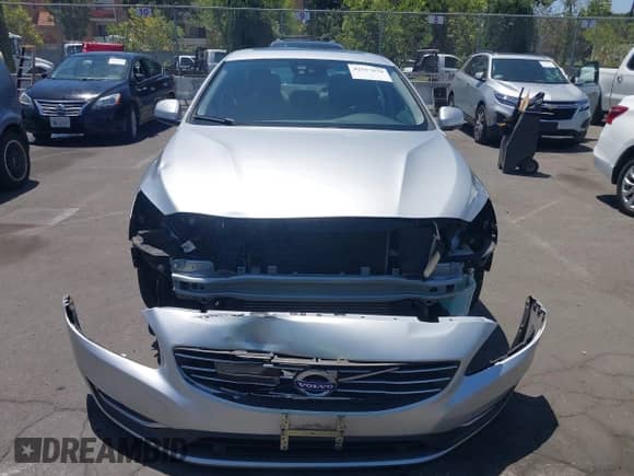 2015 Volvo S60 T5 Drive-E Premier with VIN YV126MFB8F2316406, listed as a IAAI auction lot 42517670 with 80,027 mi miles and . Bid and sale history available at DreamBid. Image 13.
