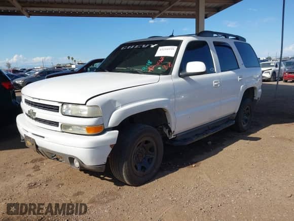 2005 Chevrolet Tahoe LS with VIN 1GNEK13T25R156837, listed as a IAAI auction lot 43254559 with 200,636 mi miles and . Bid and sale history available at DreamBid. Image 2.