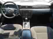 2014 Chevrolet Impala LT z VIN 2G1WB5E34E1160715, wystawiony jako Copart lot #69716525 z przebiegiem 224 750 mil mil oraz Szkoda całkowita • Salvage title. Historia ofert i sprzedaży dostępna na DreamBid. Obrazek 8.