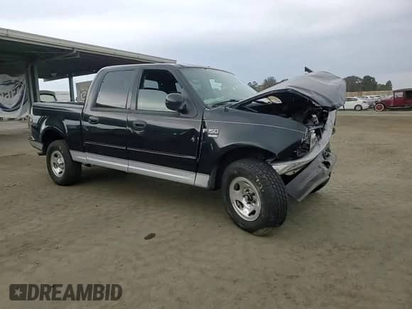 2003 Ford F-150 XLT с VIN 1FTRW07L23KB26908, выставлен на аукционе Copart как лот 84011775 с пробегом Не указан миль и Списание • Salvage title. История ставок и продаж доступна на DreamBid. Изображение 13.