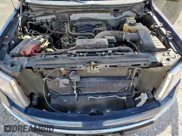 2014 Ford F-150 XLT с VIN 1FTFW1CF5EKD58401, выставлен на аукционе Copart как лот 81471875 с пробегом 114 016 миль миль и Списание • Salvage title. История ставок и продаж доступна на DreamBid. Изображение 11.