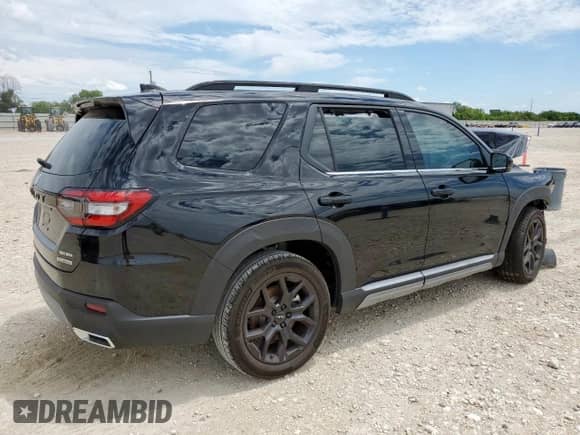 2025 Honda Pilot Touring с VIN 5FNYG2H70SB016778, выставлен на аукционе Copart как лот 60674115 с пробегом 5 294 миль миль и Списание • Salvage title. История ставок и продаж доступна на DreamBid. Изображение 3.