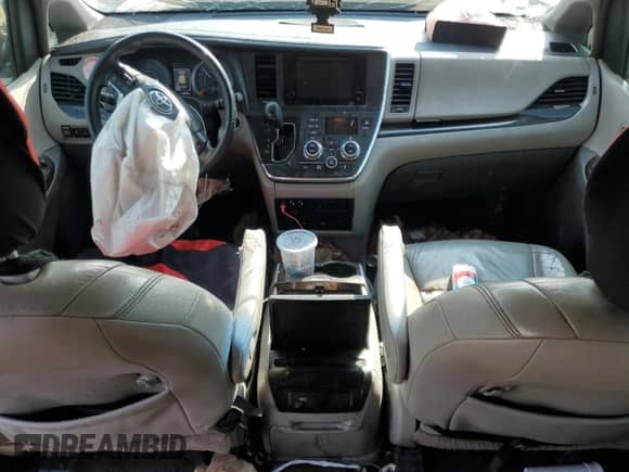 2016 Toyota Sienna XLE with VIN 5TDYK3DC4GS744257, listed as a Copart auction lot 71972955 with 121,427 mi miles and Salvage title. Bid and sale history available at DreamBid. Image 8.