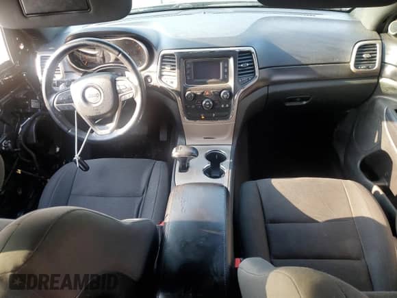 2014 Jeep Grand Cherokee Laredo with VIN 1C4RJEAG7EC282267, listed as a Copart auction lot 68341225 with 166,805 mi miles and Salvage title. Bid and sale history available at DreamBid. Image 8.