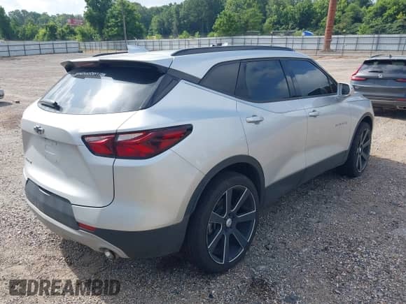 2019 Chevrolet Blazer with VIN 3GNKBBRA5KS673248, listed as a IAAI auction lot 42536237 with 77,086 mi miles and . Bid and sale history available at DreamBid. Image 4.