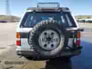 1993 Nissan Pathfinder SE z VIN JN8HD17Y0PW131143, wystawiony jako Copart lot #51848005 z przebiegiem 552 200 mil mil oraz Czysty tytuł • Clean title. Historia ofert i sprzedaży dostępna na DreamBid. Obrazek 6.