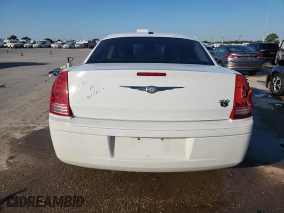 2010 Chrysler 300 S with VIN 2C3CA2CV4AH328326, listed as a Copart auction lot 71128315 with 122,788 mi miles and Salvage title. Bid and sale history available at DreamBid. Image 6.