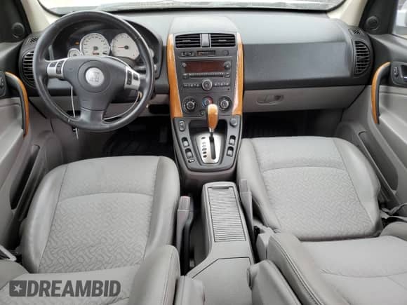 2006 Saturn VUE z VIN 5GZCZ53476S875618, wystawiony jako Copart lot #71250894 z przebiegiem 186 577 mil mil oraz Czysty tytuł • Clean title. Historia ofert i sprzedaży dostępna na DreamBid. Obrazek 8.