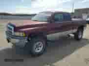 2000 Dodge 1500 with VIN 3B7HF12ZXYG129339, listed as a Copart auction lot 51156455 with 167,808 mi miles and Salvage title. Bid and sale history available at DreamBid. Image 1.