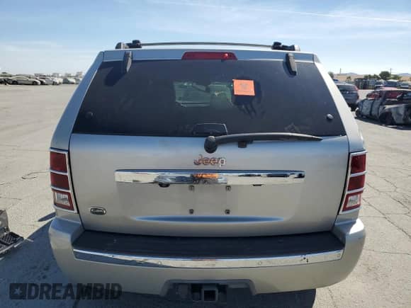 2009 Jeep Grand Cherokee with VIN 1J8HR68T79C513096, listed as a Copart auction lot 71654425 with 225,048 mi miles and Salvage title. Bid and sale history available at DreamBid. Image 6.