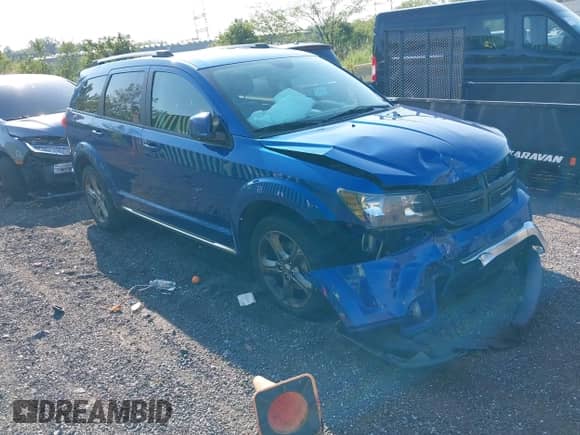 2015 Dodge Journey Crossroad with VIN 3C4PDDGG1FT579170, listed as a IAAI auction lot 42820291 with 97,385 mi miles and . Bid and sale history available at DreamBid. Image 1.