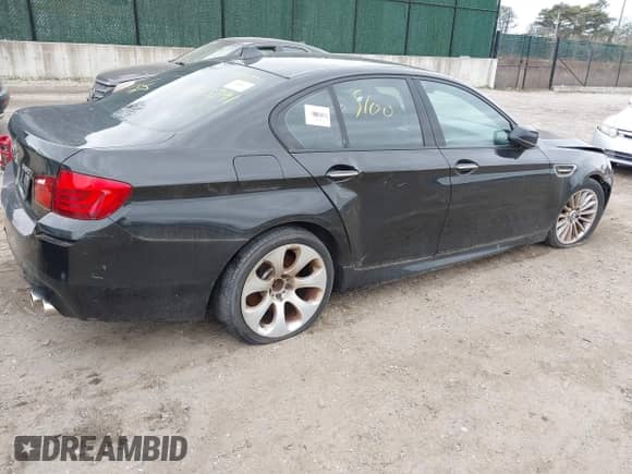 2012 BMW 5 Series 550i xDrive with VIN WBAFU9C55CC786985, listed as a IAAI auction lot 42025402 with Not provided miles and . Bid and sale history available at DreamBid. Image 4.