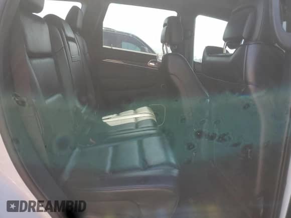 2016 Jeep Grand Cherokee High Altitude with VIN 1C4RJFCT8GC423463, listed as a Copart auction lot 70821095 with 144,093 mi miles and Salvage title. Bid and sale history available at DreamBid. Image 10.