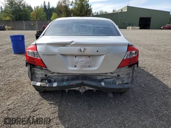 2012 Honda Civic with VIN 2HGFB2F22CH515706, listed as a Copart auction lot 71010745 with 181,438 mi miles and Salvage title. Bid and sale history available at DreamBid. Image 6.