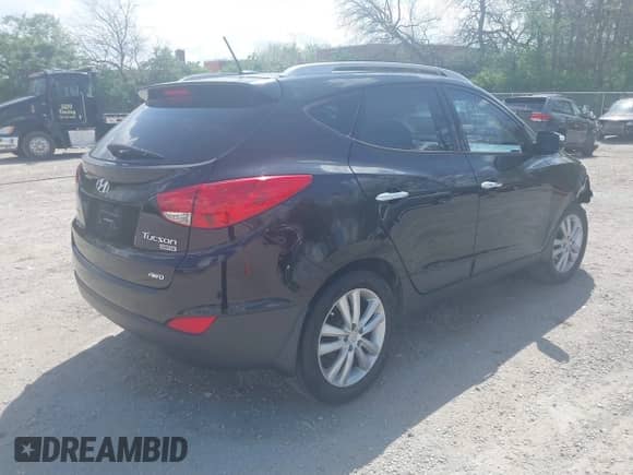 2013 Hyundai Tucson GLS с VIN KM8JUCAC0DU583070, выставлен на аукционе IAAI как лот 42112460 с пробегом 142 720 миль миль и . История ставок и продаж доступна на DreamBid. Изображение 4.