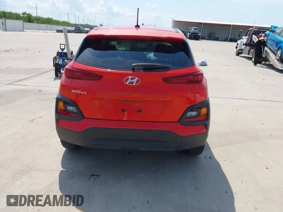2019 Hyundai Kona SE with VIN KM8K12AA8KU320361, listed as a IAAI auction lot 43021320 with 100,571 mi miles and . Bid and sale history available at DreamBid. Image 16.