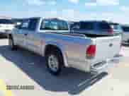 2002 Dodge Dakota SLT with VIN 1B7GL42X52S532391, listed as a IAAI auction lot 43324449 with 85,046 mi miles and . Bid and sale history available at DreamBid. Image 3.