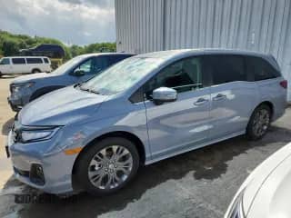 2025 Honda Odyssey Touring с VIN 5FNRL6H87SB074287, выставлен на аукционе Copart как лот 65152345 с пробегом Не указан миль и Списание • Salvage title. История ставок и продаж доступна на DreamBid. Изображение 1.