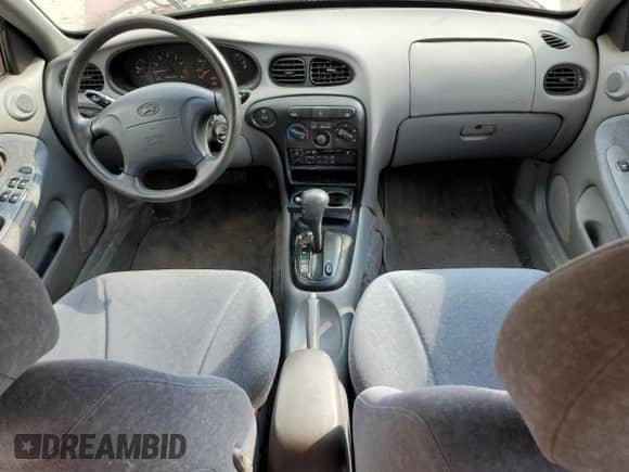 1999 Hyundai Elantra с VIN KMHJW35F0XU129498, выставлен на аукционе Copart как лот 74481134 с пробегом 72 123 миль миль и Чистый • Clean title. История ставок и продаж доступна на DreamBid. Изображение 8.