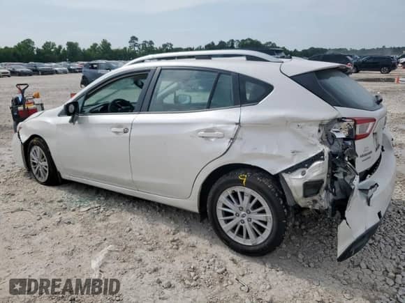 2018 Subaru Impreza Premium with VIN 4S3GTAD65J3709159, listed as a Copart auction lot 66761385 with 77,087 mi miles and Salvage title. Bid and sale history available at DreamBid. Image 2.