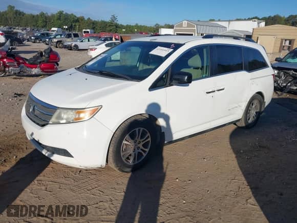 2012 Honda Odyssey EX с VIN 5FNRL5H42CB062606, выставлен на аукционе IAAI как лот 43351915 с пробегом 197 498 миль миль и . История ставок и продаж доступна на DreamBid. Изображение 17.