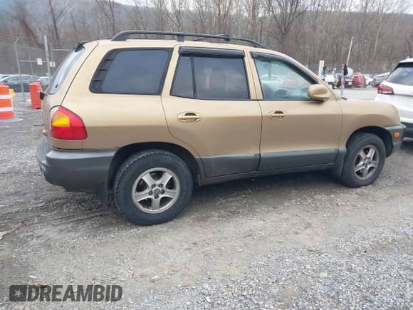 2002 Hyundai Santa Fe GLS with VIN KM8SC13D82U333753, listed as a IAAI auction lot 41425102 with 200,790 mi miles and . Bid and sale history available at DreamBid. Image 4.